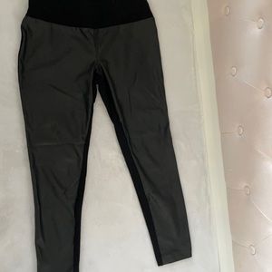 black leather pants in front, black stretchy material on the back, hight waist,